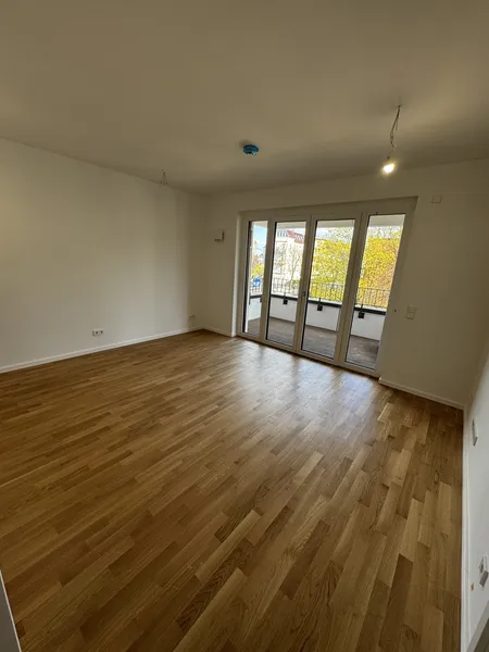 Modernes Wohnen in Weißensee: Brandneue (Erstbezug) 2-Zimmer-Wohnung mit Balkon und Einbauküche — photo 1
